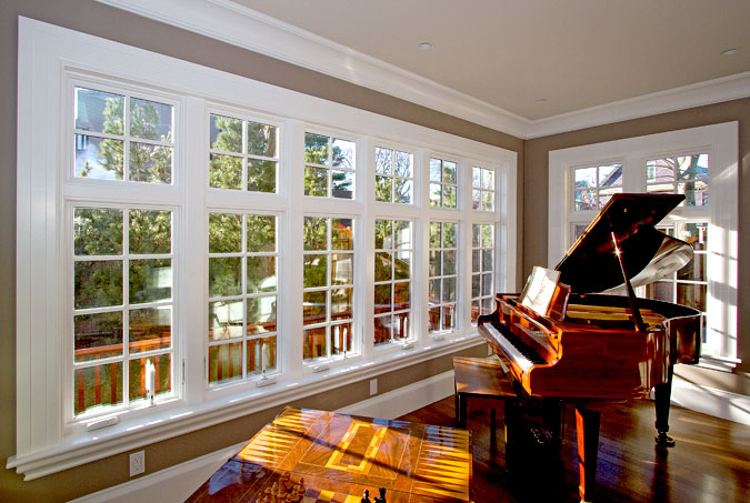 Sunroom trimmed with hand-milled window casings and moulding