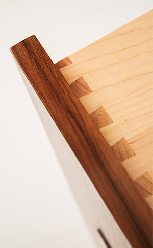 Hand-cut dovetails at a drawer corner
