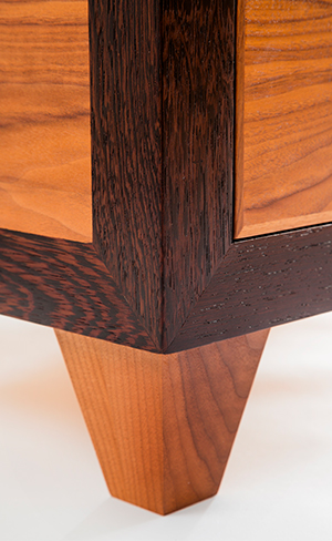 Shaped solid-wood leg of the Gustav dresser